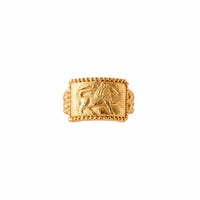 Gold ring with a lion engraved design