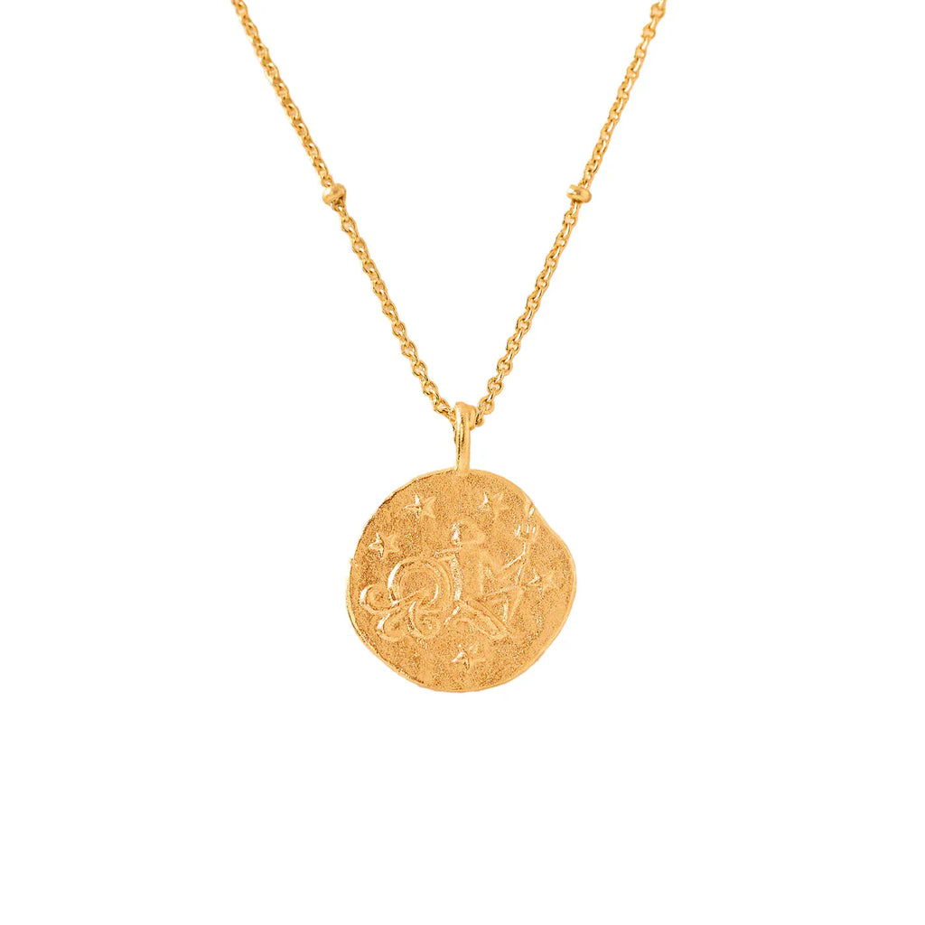 gold necklace with a round aquarius zodiac pendant