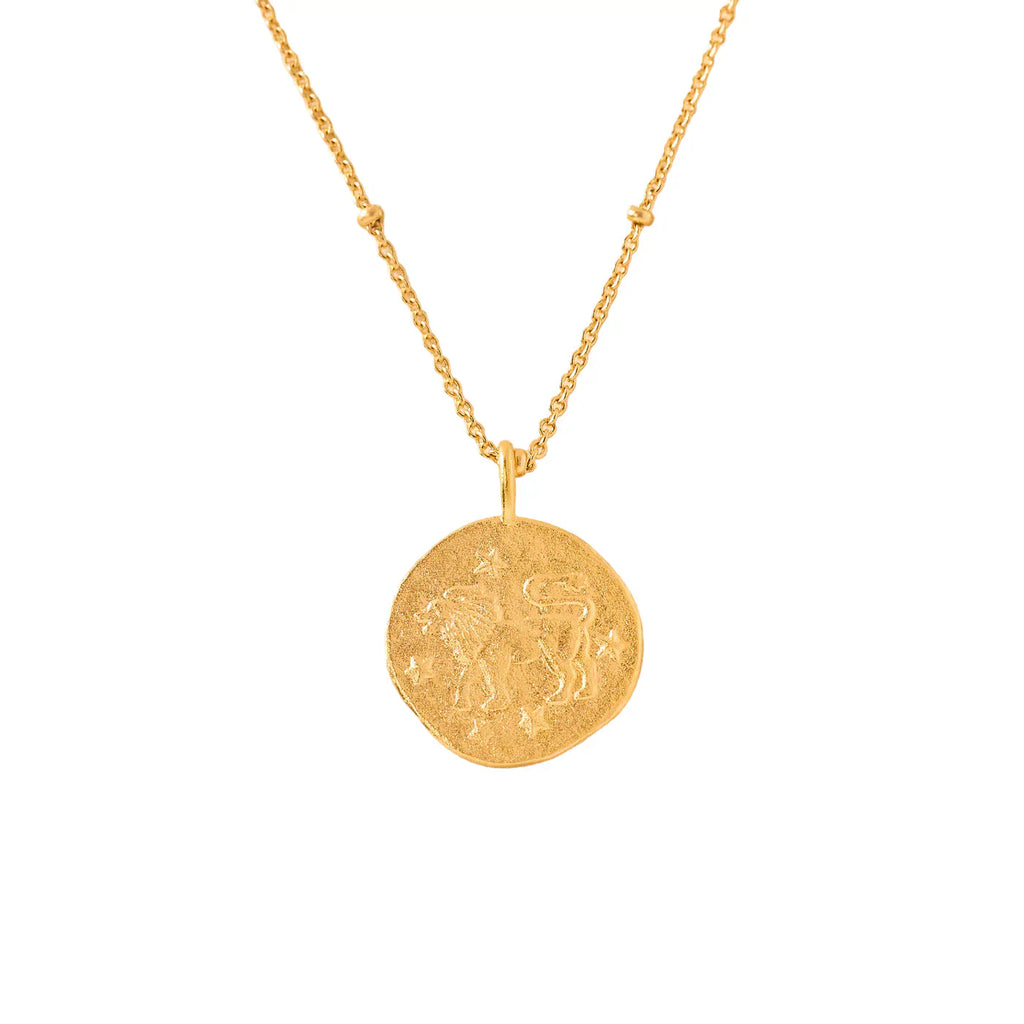 gold necklace with a round leo zodiac pendant