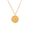 gold necklace with a round libra zodiac pendant