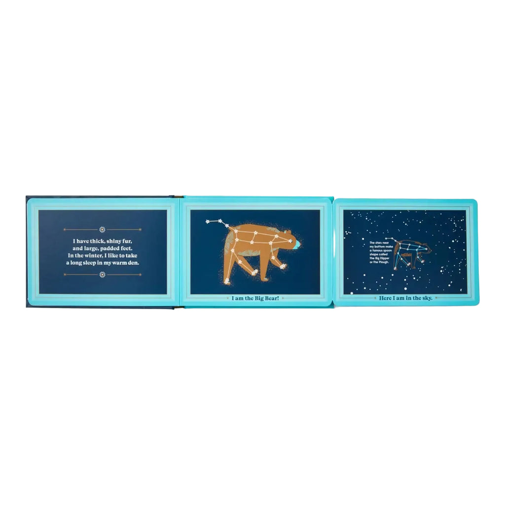 Children's book open to pages showing a bear constellation diagram and text on a light blue background