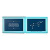Open book with constellation illustration and text on a white background