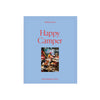 Puzzle box titled 'Happy Camper' with a blue cover and photo of a camper interior.