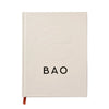 Beige notebook with 'BAO' printed on it against a white background