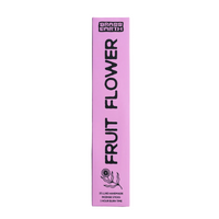 A tall, narrow pink box for Brass Earth Fruit Flower incense sticks, featuring bold black text and a small line drawing of a flower, set against a solid lavender-purple background.