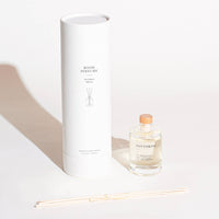Room perfume bottle with packaging on a white background