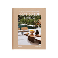 Book cover of 'Côte d'Azur Living' with an outdoor scene and text on a beige background