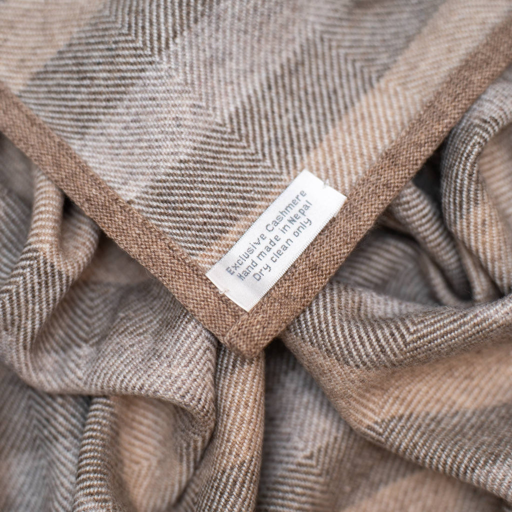 cashmere blanket with white tag 