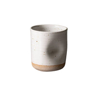 ceramic cup with divot for thumb