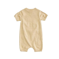 Beige baby romper on a white background
