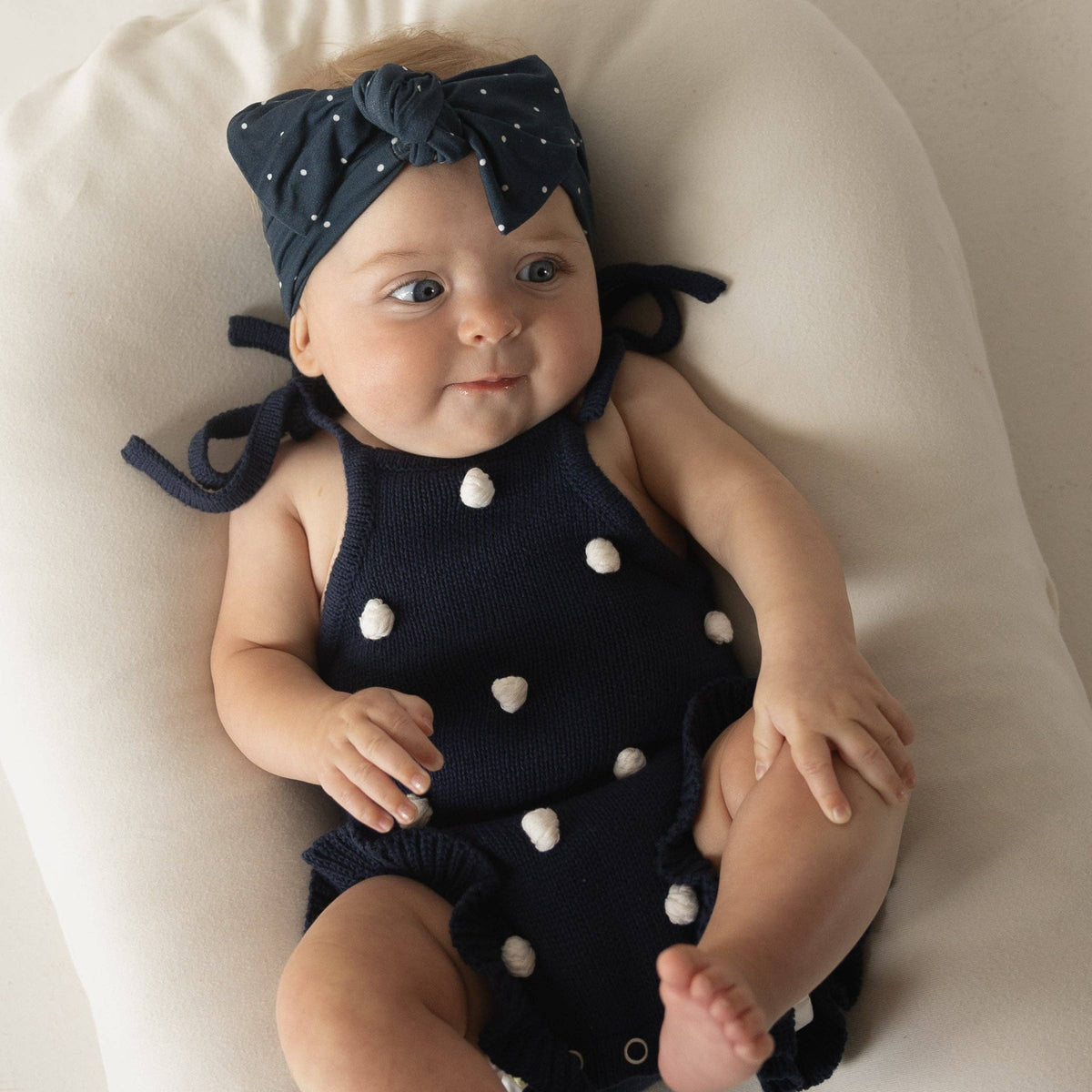 Poka Dot Navy Blue Knit Ruffle Romper