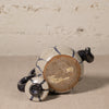Ceramic teapot with a visible brand name on a neutral background