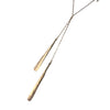 Gold necklace with a chain on a white background