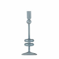 light blue glass candle holder on a white background
