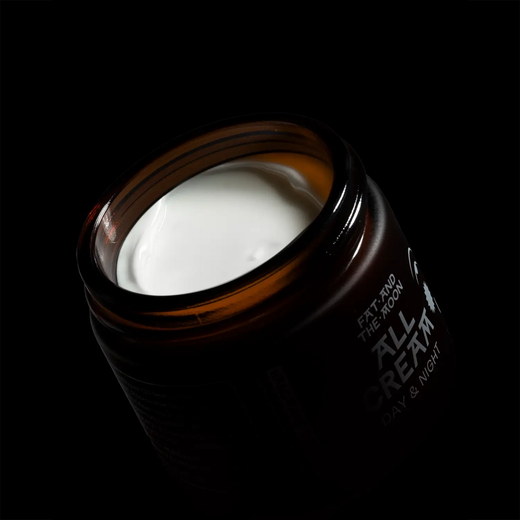 Jar of 'All Cream' with a dark background