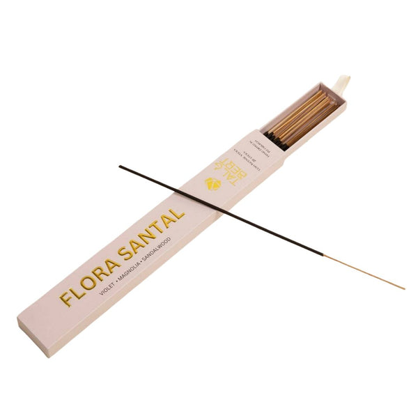 Incense sticks in a 'Flora Santal' box on a white background