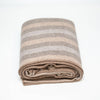 folded striped cashmere blanket on white background