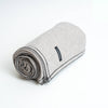 gray cashmere banket rolled on white background