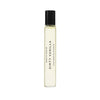 White cylindrical perfume bottle with a ribbed texture on a white background