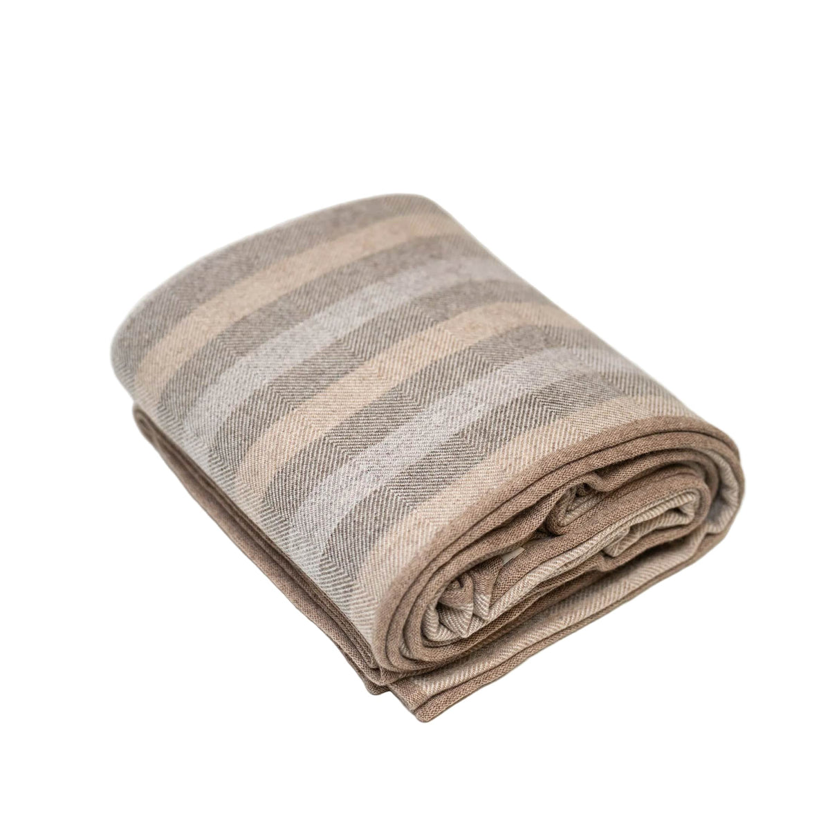 striped blanket neatly folded on white background