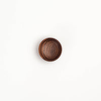 Wooden bowl on a white background