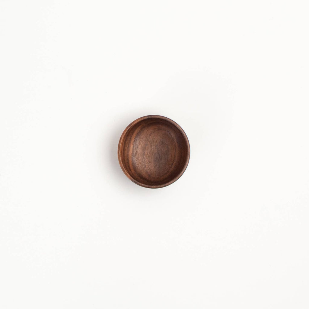 Wooden bowl on a white background