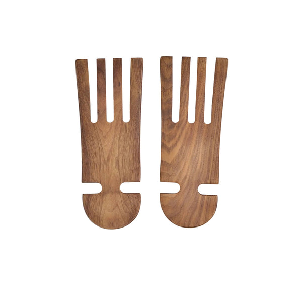 Two wooden salad servers on a white background