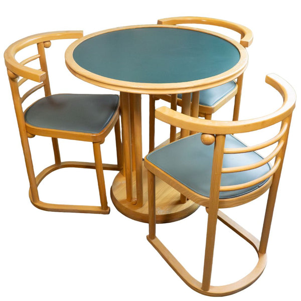 Round table with three chairs on a white background