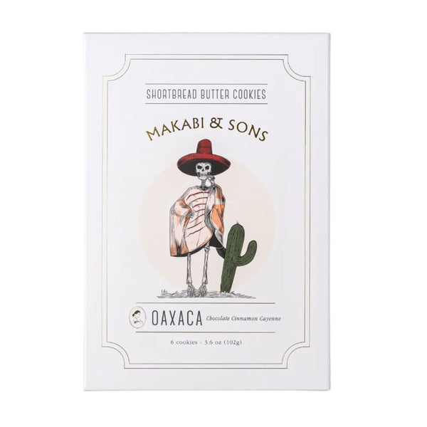 Packaging of Makabi & Sons shortbread butter cookies with skeleton and cactus illustration on a white background