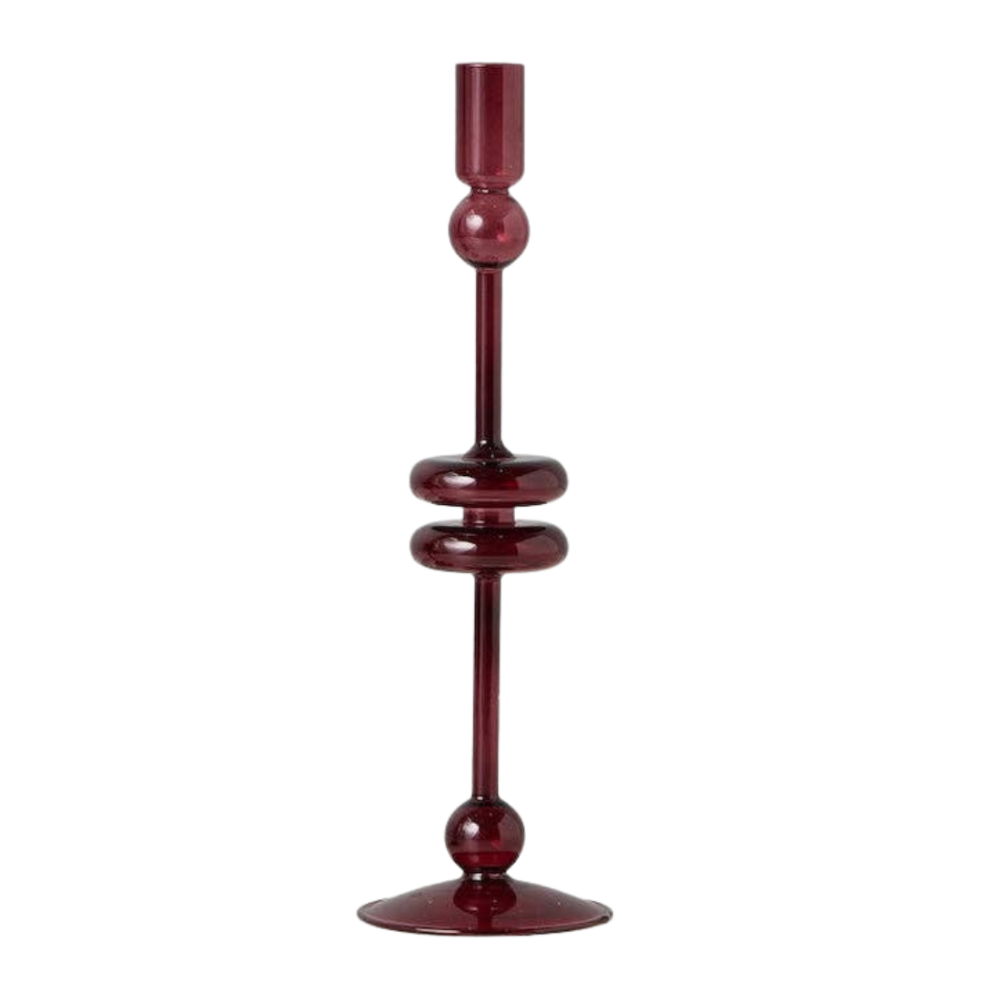 A tall, slender burgundy glass candlestick holder with decorative rounded sections, shown on a plain white background.