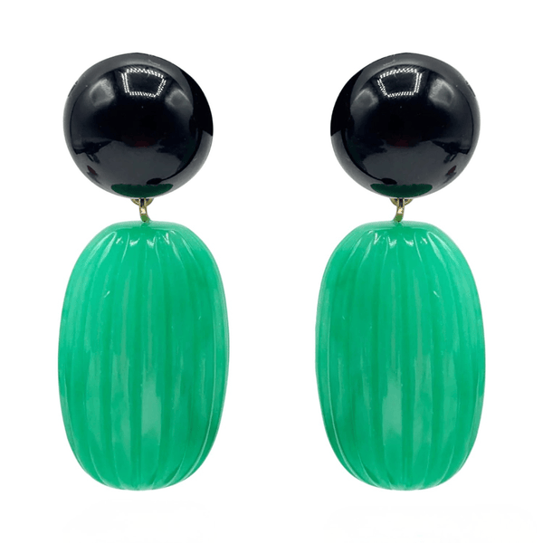 Pair of earrings with black and green beads on a white background