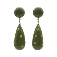 Green teardrop earrings with gold accents on a white background