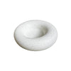 A circular donut-shaped soap dish or tray made of speckled white stone or concrete, shown on a plain white background.