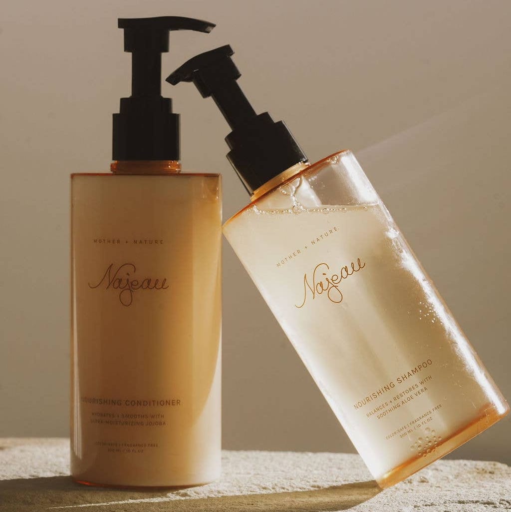 Two bottles of 'Najeau' shampoo and conditioner on a textured surface with a neutral background.