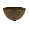 Brown ceramic bowl on a light gray background