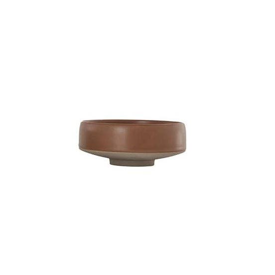 Ceramic bowl with a brown glaze on a white background
