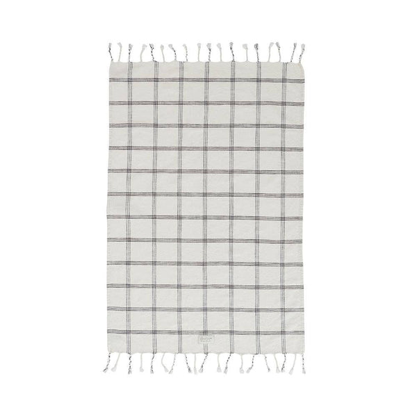Plaid towel with fringe on a white background