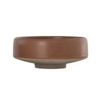 Brown ceramic bowl on a white background