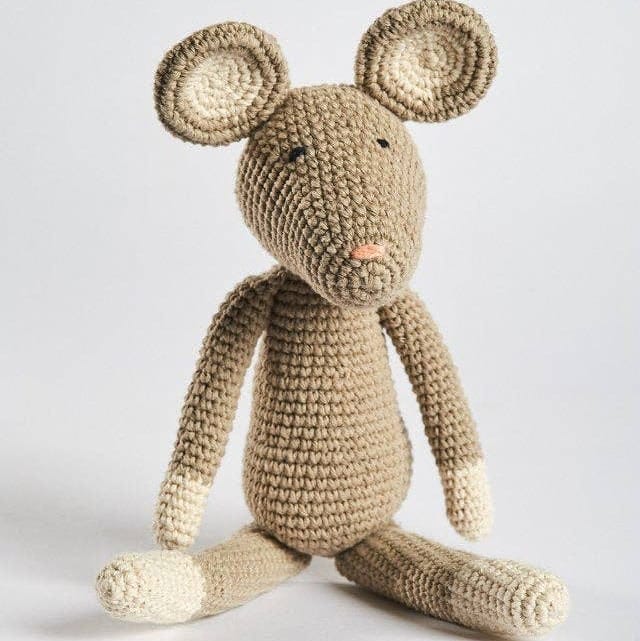 Crocheted mouse toy on a white background