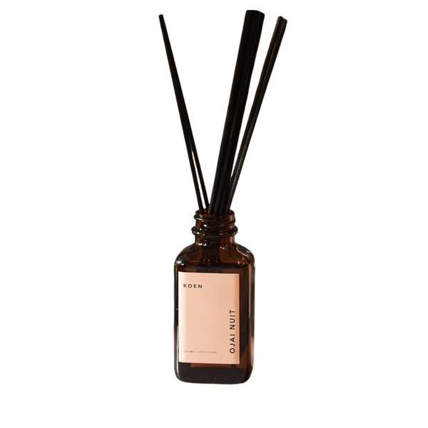 Roen Ojai Nuit diffuser with black reeds on a white background