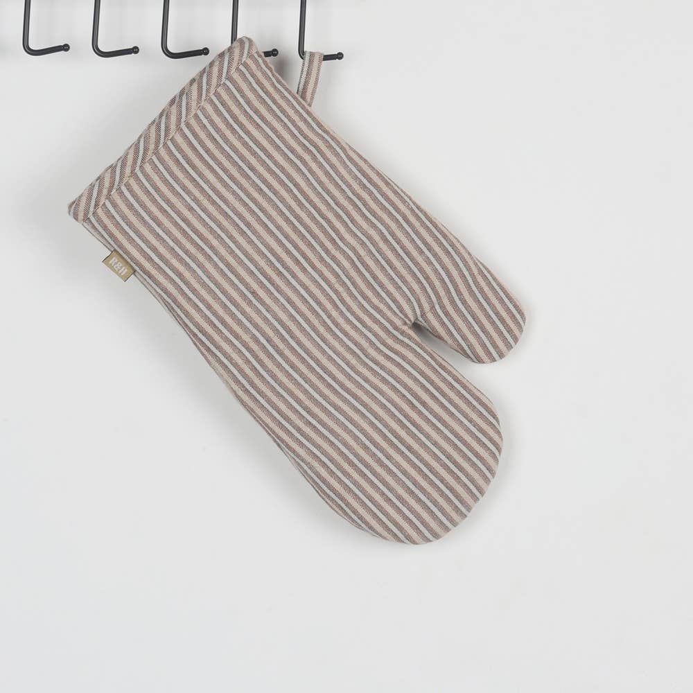 Striped oven mitt hanging on a rack against a white background