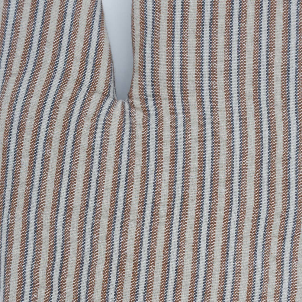 Close-up of striped fabric with brown, blue, and beige colors.