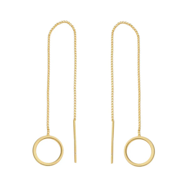Gold earrings with circular ends on thin chains against a white background