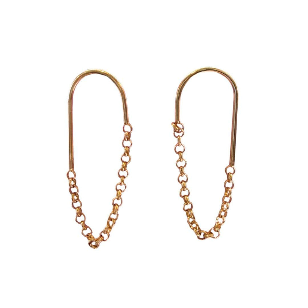 Gold chain earrings on a white background