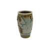 Ceramic vase with artistic design on a white background