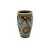 Ceramic cup with artistic design on a white background