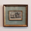 framed print of historic town of st. george on light blue matting and a brown frame on a white background