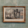 close up of historic art print framed on blue raw silk matting
