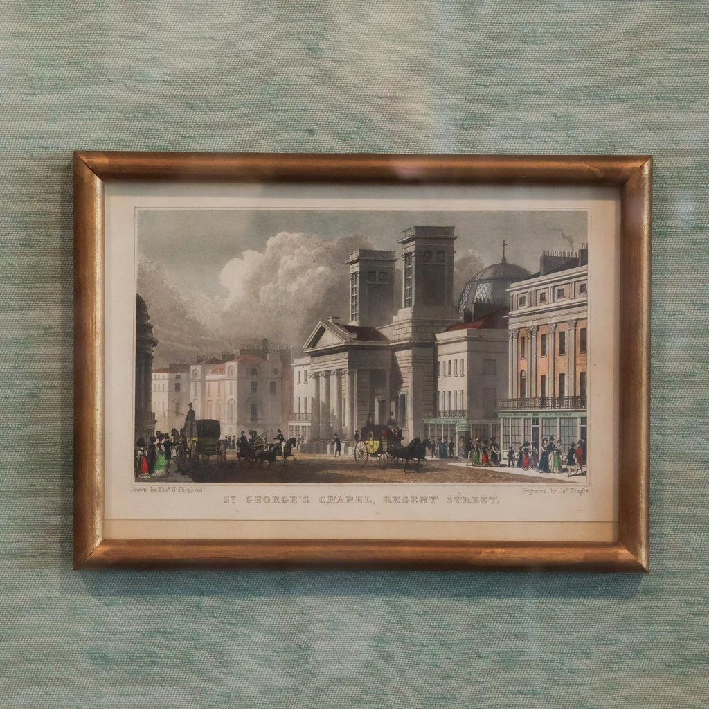 close up of historic art print framed on blue raw silk matting