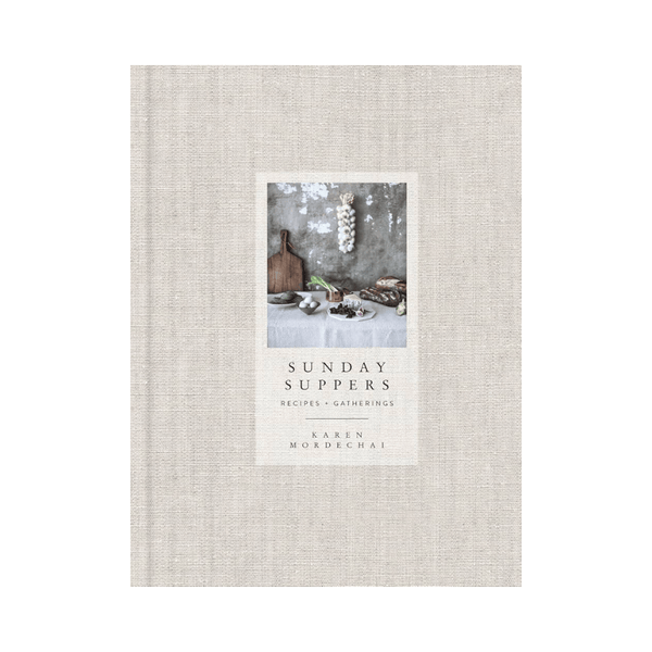 Cookbook titled 'Sunday Suppers' with a photo of a table setting on the cover.